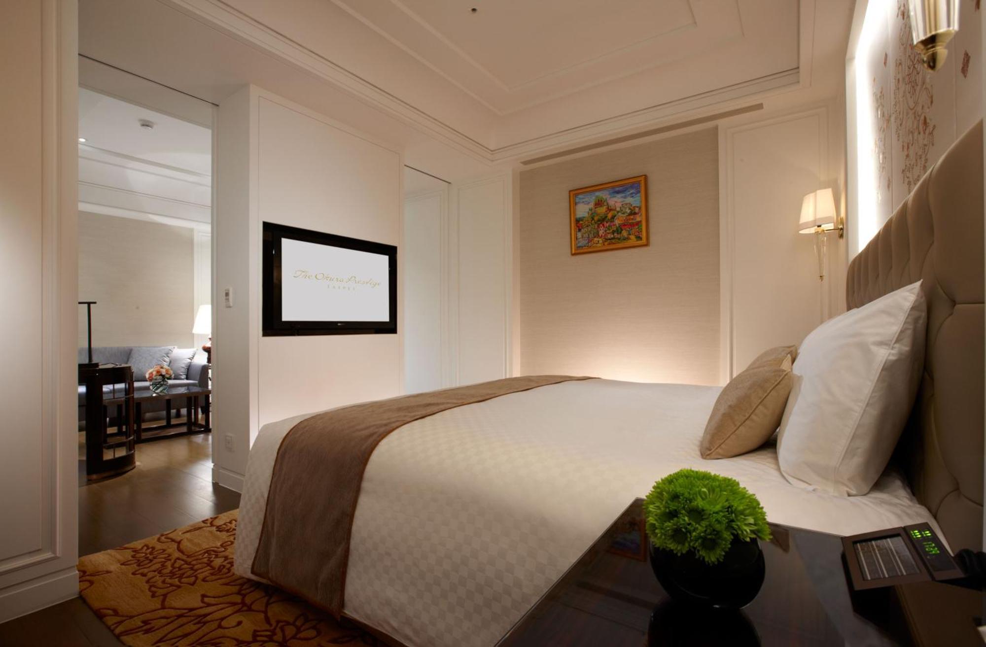 The Okura Prestige Taipei Hotel Exterior foto A bedroom at the hotel